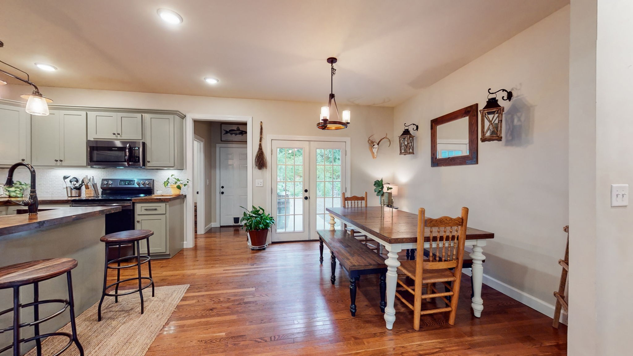 150 Carter Hollow Road Liberty, TN 37095 - Photo 8 of 56 a view of a dining room with furniture window and wooden floor