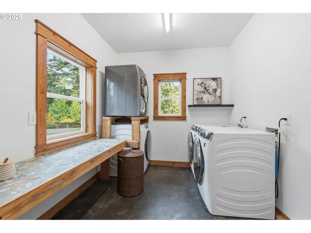 a kitchen with a refrigerator and a sink