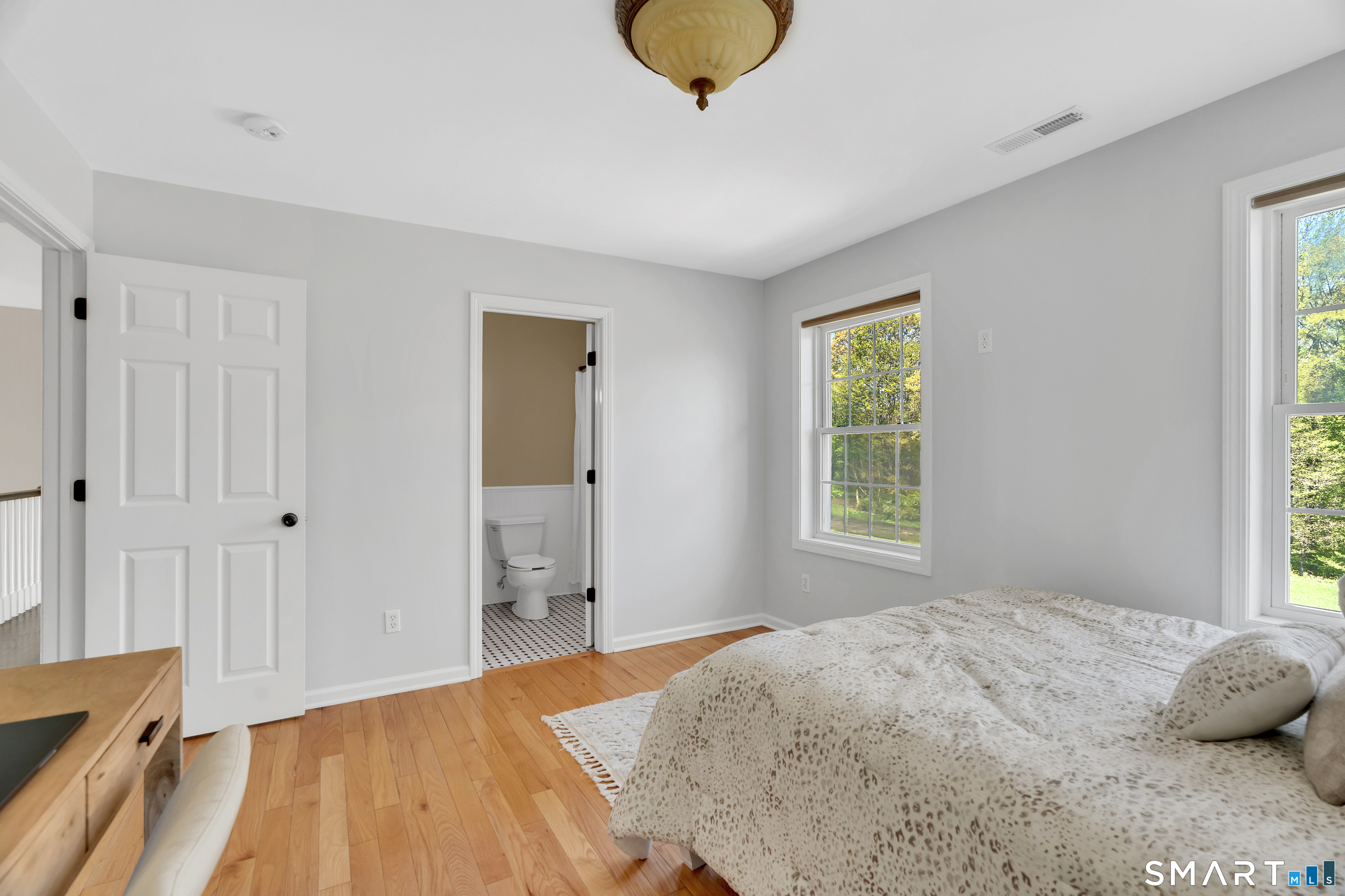 94 Cooks Lane Guilford, CT 06437 - Photo 24 of 40 Bedroom ensuite with private bathroom