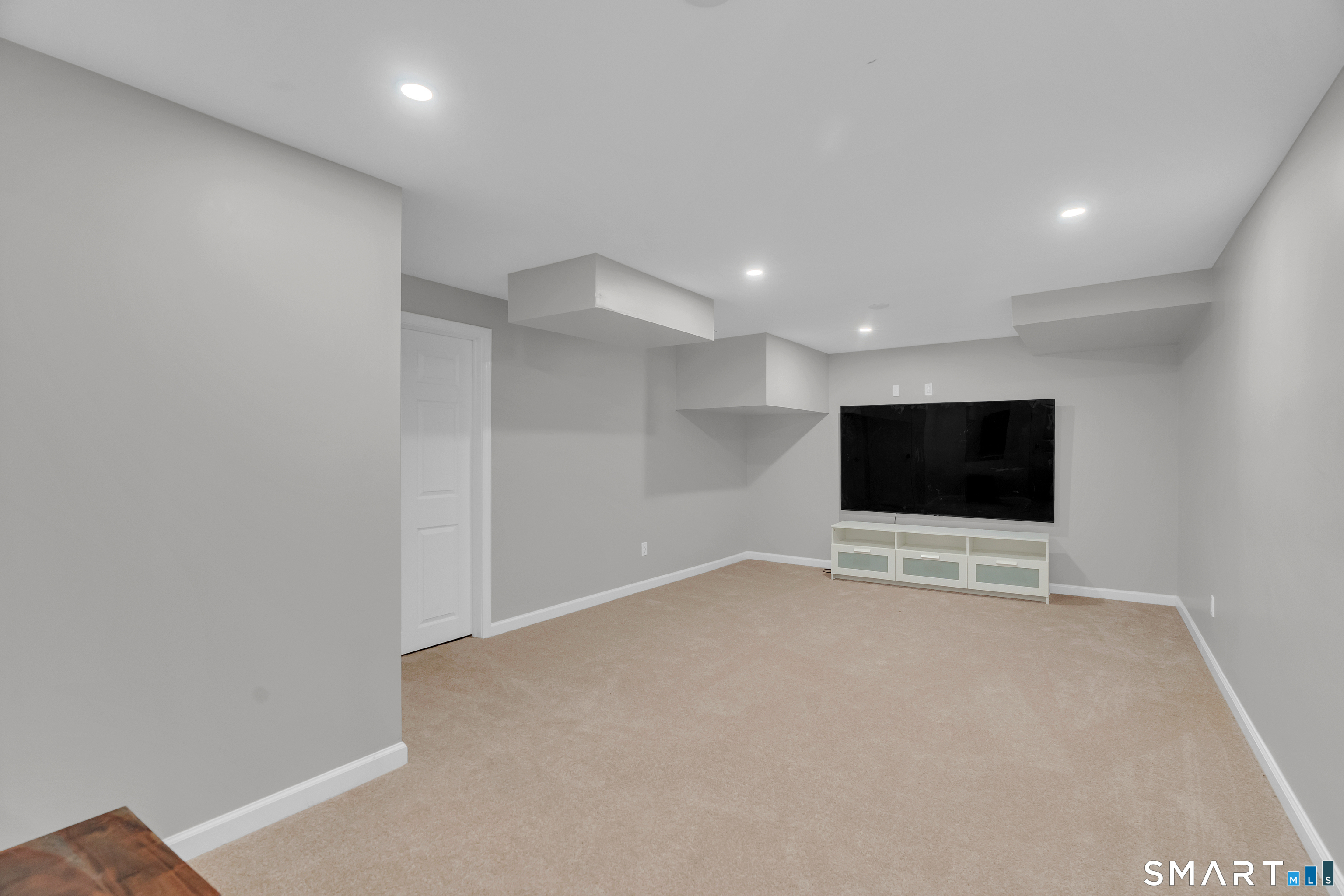94 Cooks Lane Guilford, CT 06437 - Photo 30 of 40 Finished flex space in the lower level