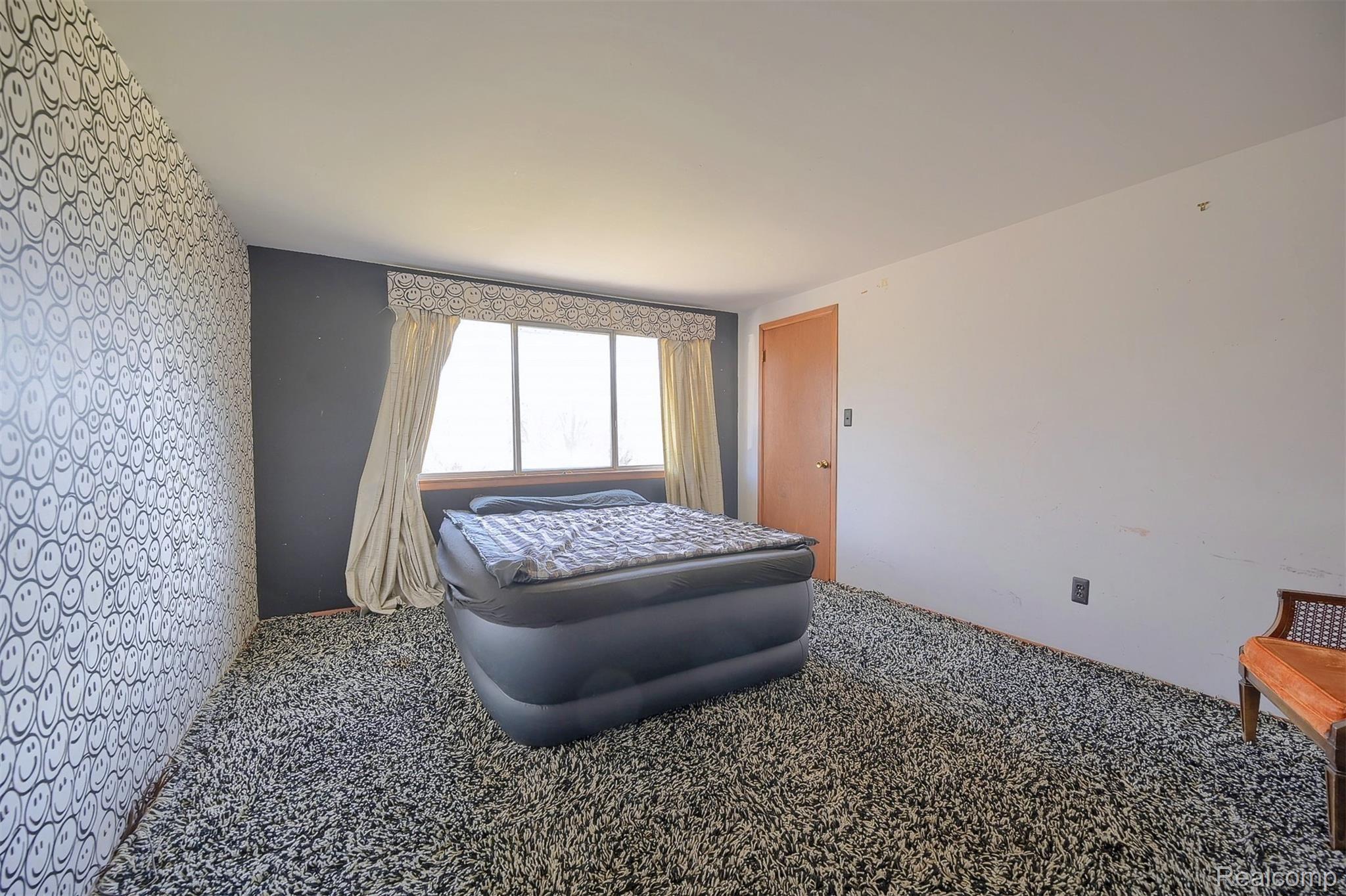 54400 9 Mile Road South Lyon, MI 48178 - Photo 26 of 37 26-3rd-Bedroom.jpg