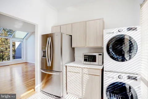 a view of kitchen and washer and dryer