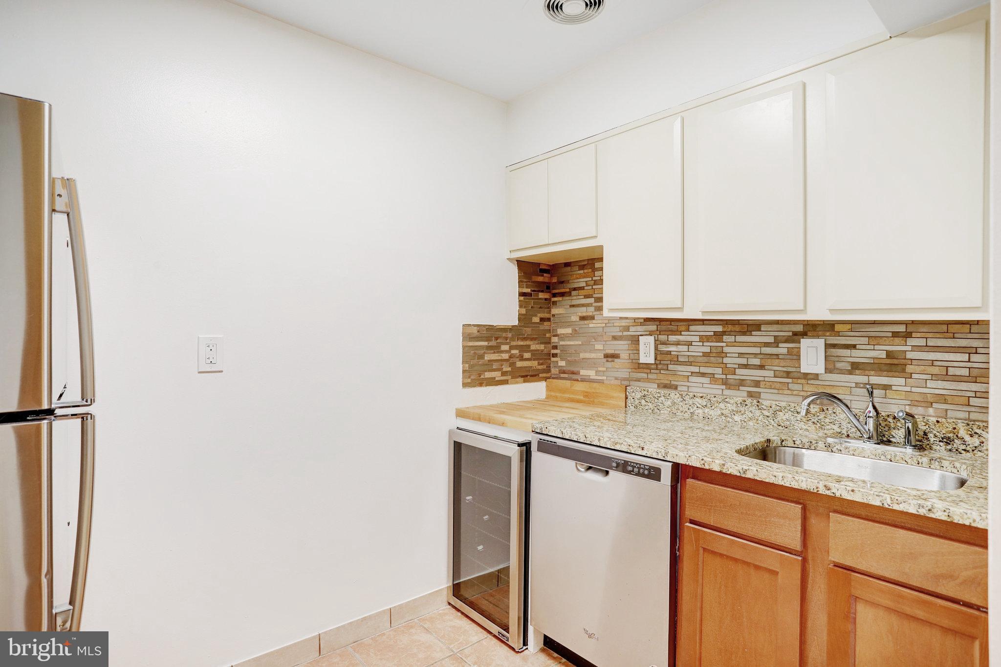 42 G Street Southwest Washington, DC 20024 - Photo 33 of 54 a kitchen with a sink and cabinets