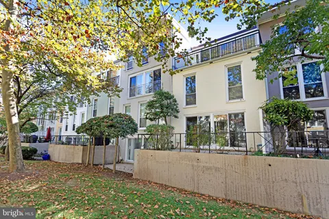a view of a building with sitting area