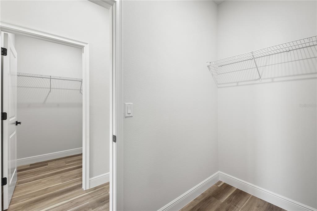 5217 Southwest 165th St Road Ocala, FL 34473 - Photo 27 of 35 a view of a room with racks on the wall