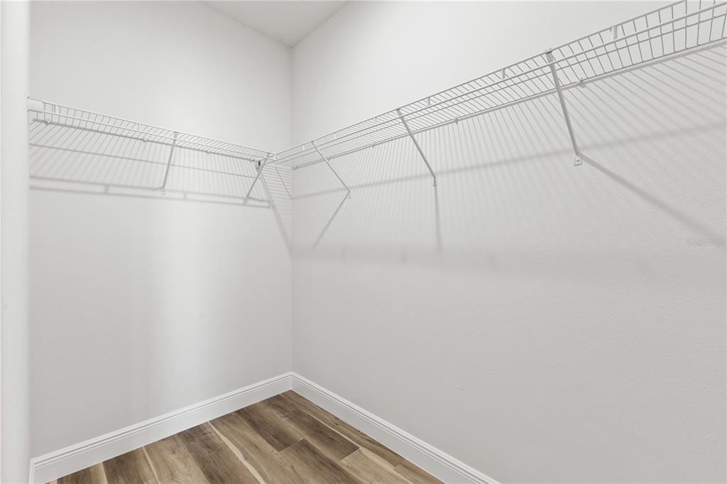 5217 Southwest 165th St Road Ocala, FL 34473 - Photo 29 of 35 a view of a room with racks on the wall