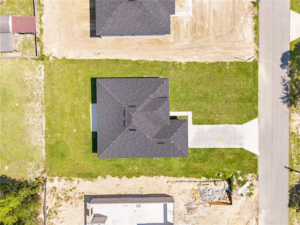 5217 Southwest 165th St Road Ocala, FL 34473 - Photo 35 of 35 a view of front door of house with yard