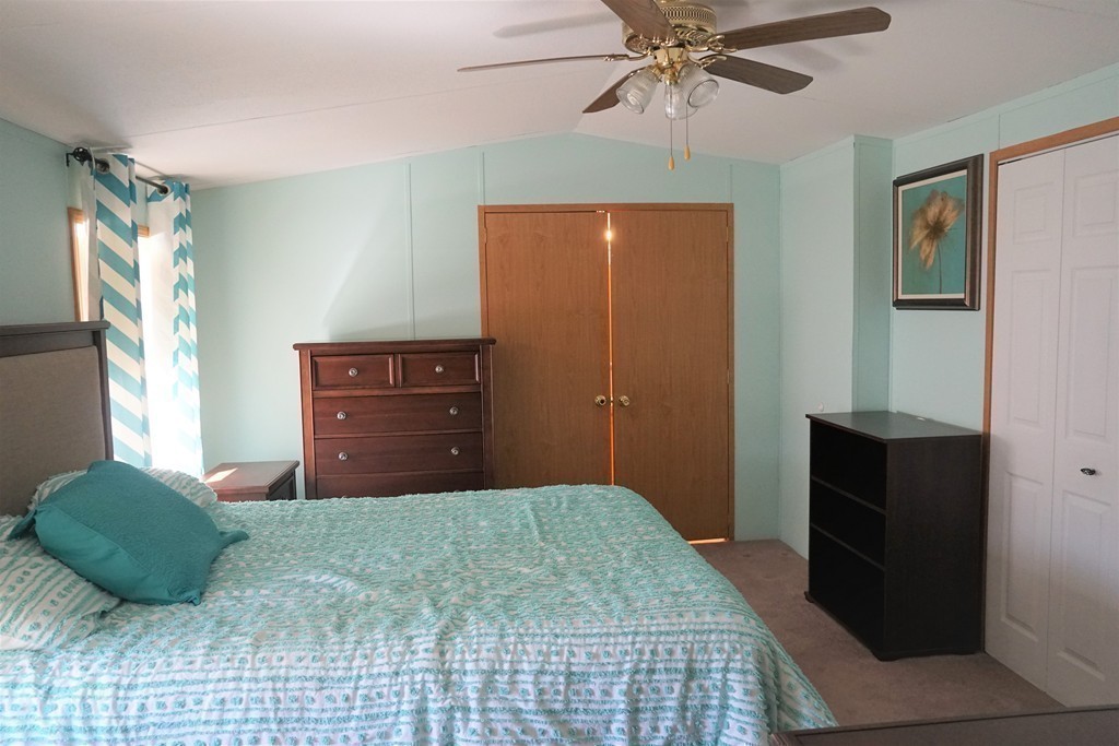 62 Cypress Road Taunton, MA 02780 - Photo 21 of 26 a bedroom with a bed and a dresser