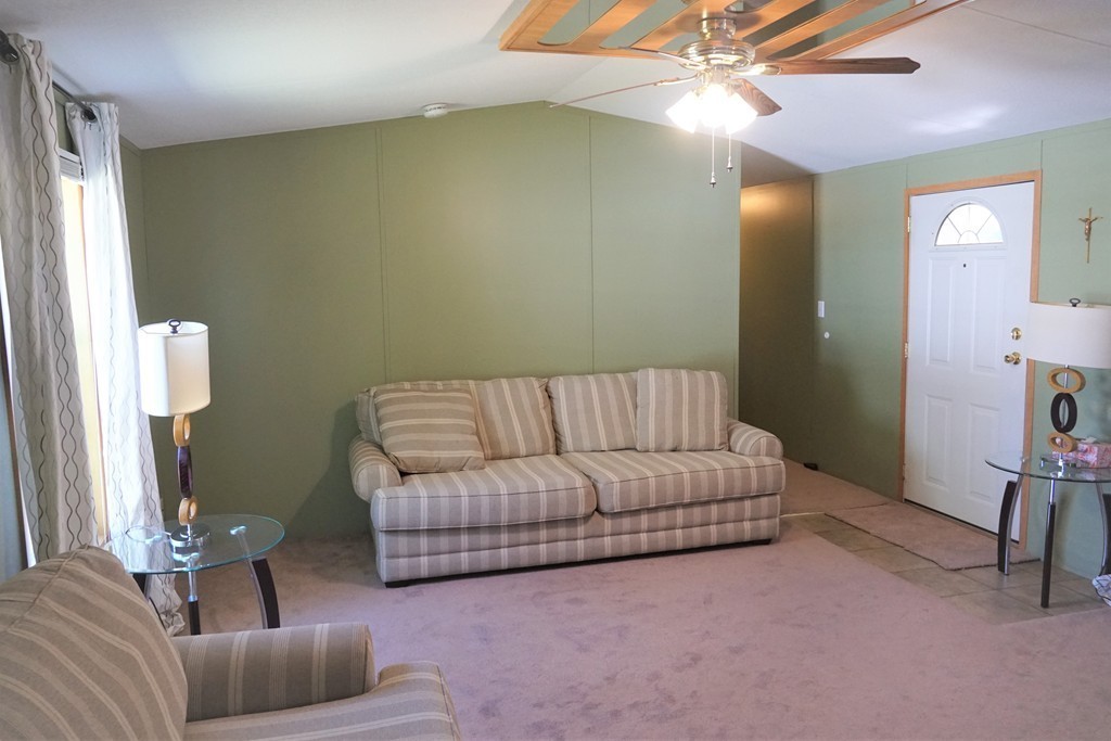 62 Cypress Road Taunton, MA 02780 - Photo 6 of 26 a living room with furniture and a couch