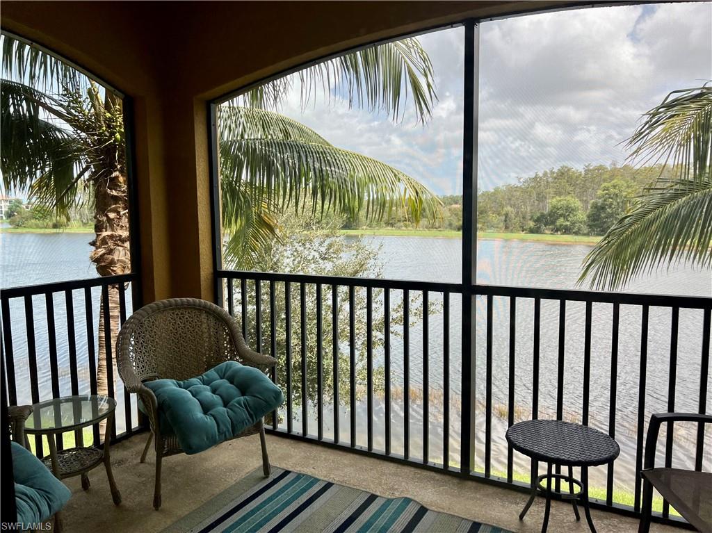9584 Trevi Court, Unit 5223 Naples, FL 34113 - Photo 40 of 42 a side of a bench in the balcony