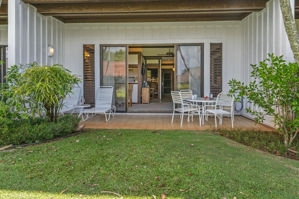 2253 Poipu Road, Unit 85 Koloa, HI 96756 - Photo 13 of 13 a house with garden in front of it