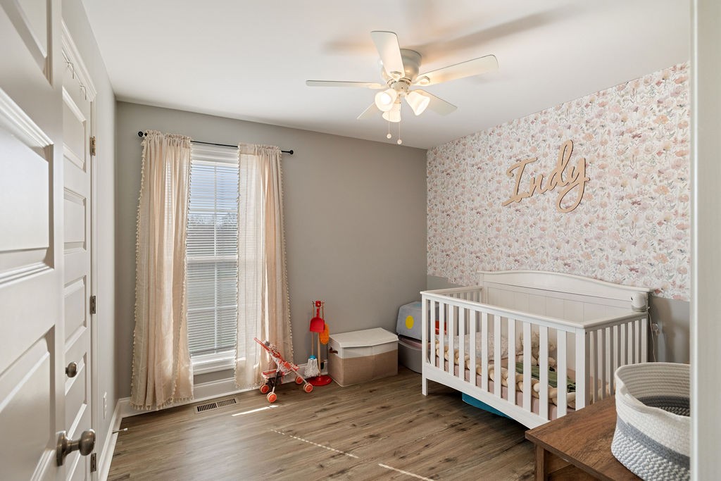 123 Timber Rdg Drive Pulaski, TN 38478 - Photo 12 of 20 a bedroom with a bed and wooden floor