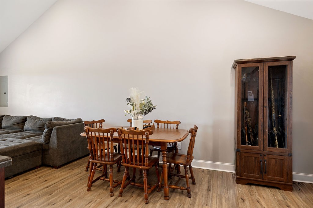 123 Timber Rdg Drive Pulaski, TN 38478 - Photo 10 of 20 a view of a dining room with furniture and wooden floor