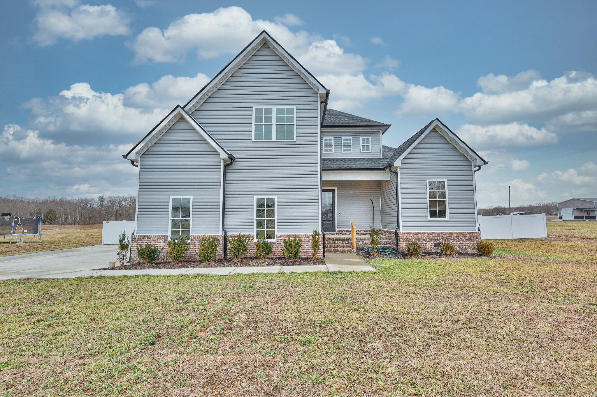1181 Norton Road Manchester, TN 37355 - Photo 2 of 51 a front view of house with yard and seating area