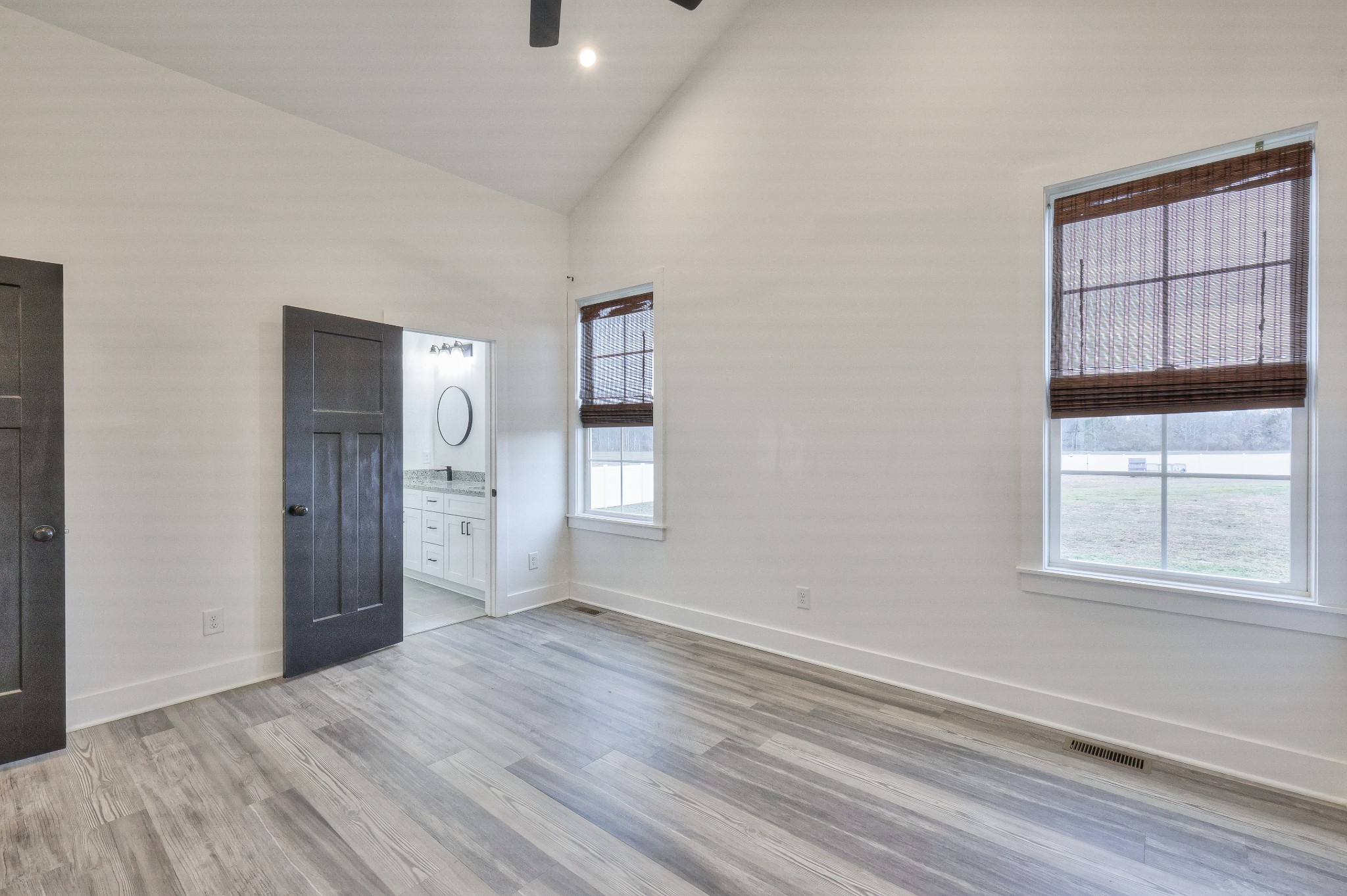 1181 Norton Road Manchester, TN 37355 - Photo 21 of 51 an empty room with wooden floor closet and windows