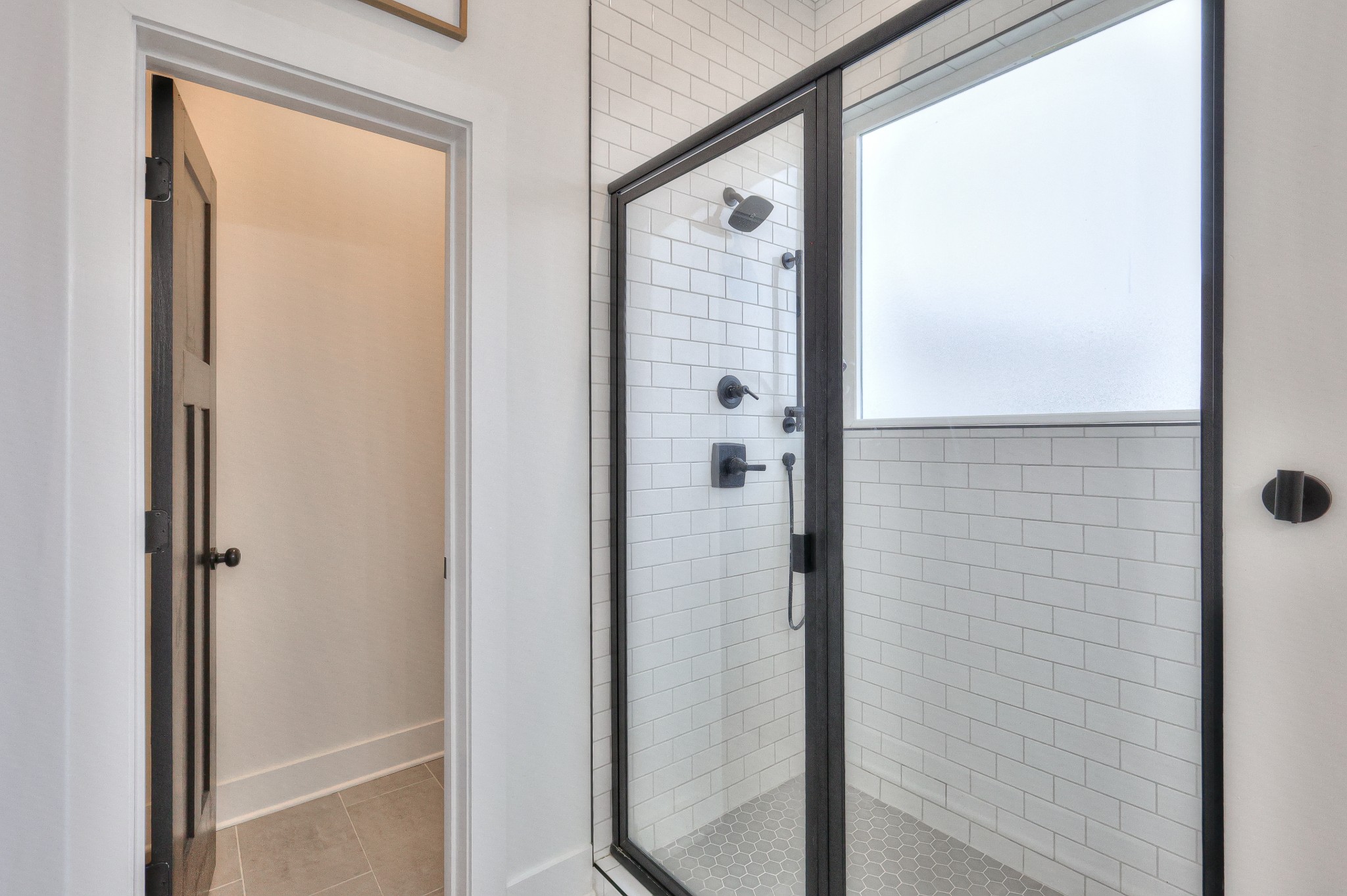 1181 Norton Road Manchester, TN 37355 - Photo 25 of 51 a bathroom with a glass shower door