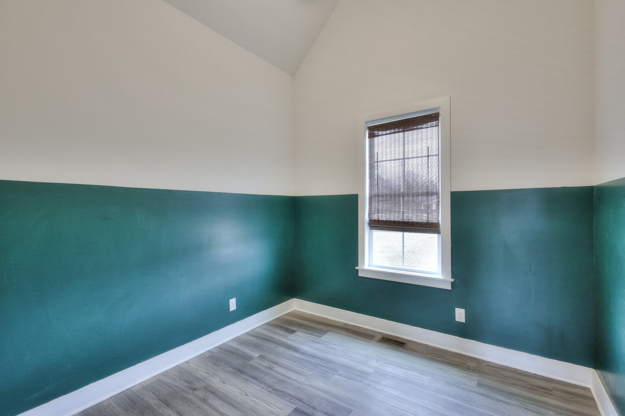 1181 Norton Road Manchester, TN 37355 - Photo 27 of 51 a view of an empty room with wooden floor and a window