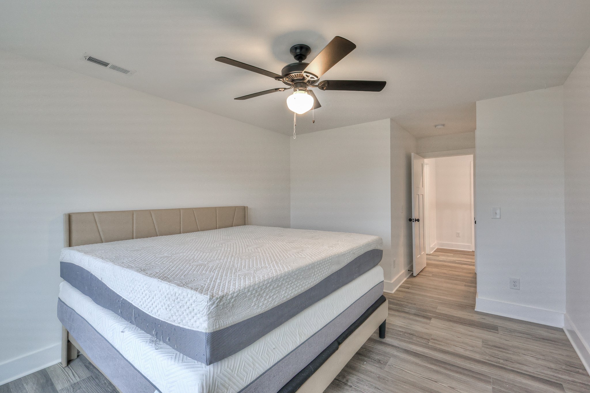 1181 Norton Road Manchester, TN 37355 - Photo 32 of 51 a bedroom with a bed and a ceiling fan