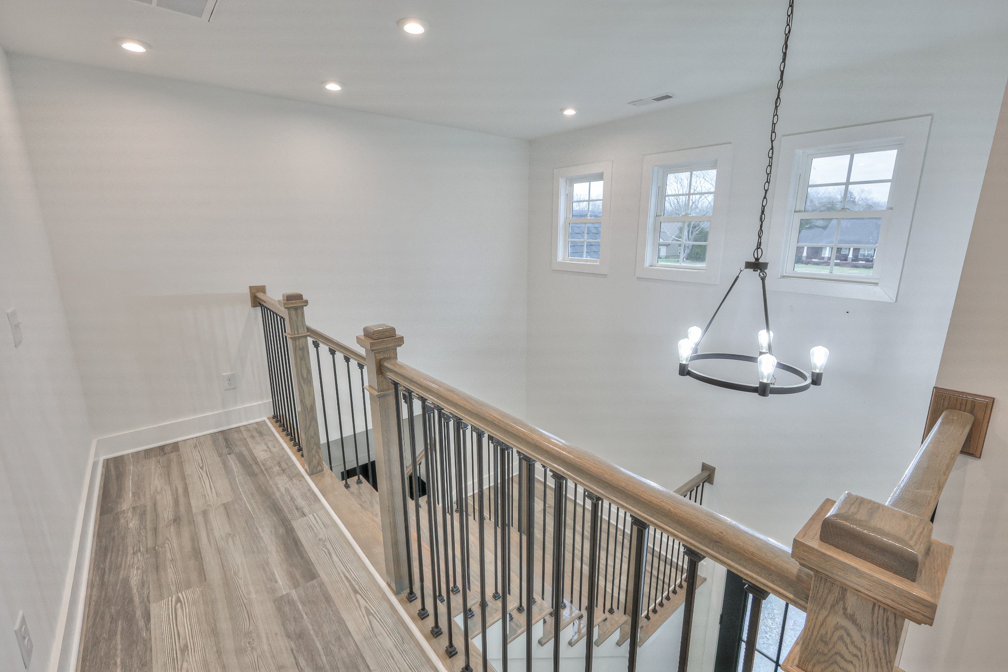 1181 Norton Road Manchester, TN 37355 - Photo 36 of 51 a view of a hallway with wooden floor and staircase
