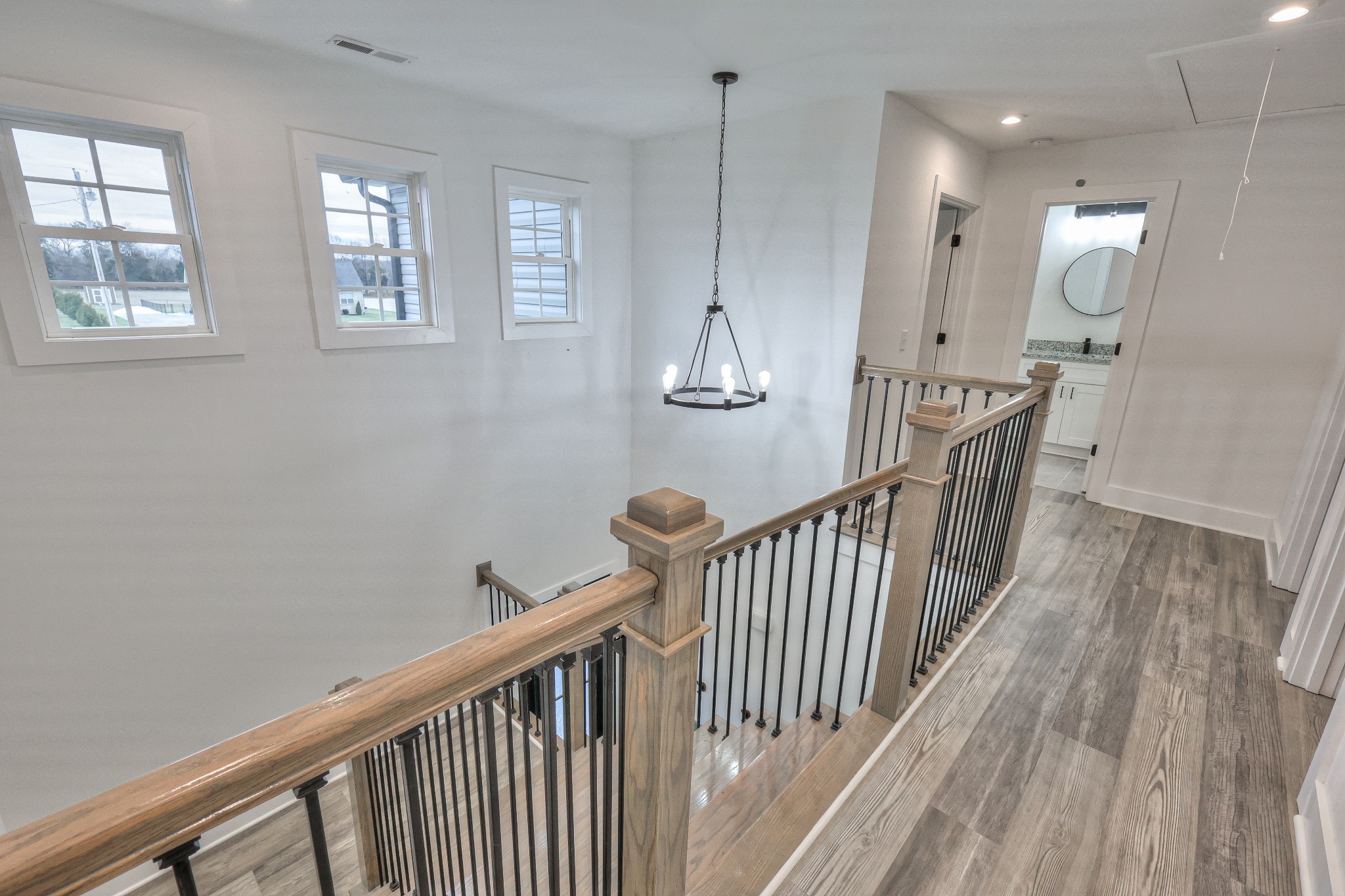 1181 Norton Road Manchester, TN 37355 - Photo 39 of 51 a view of a hallway with wooden floor and staircase