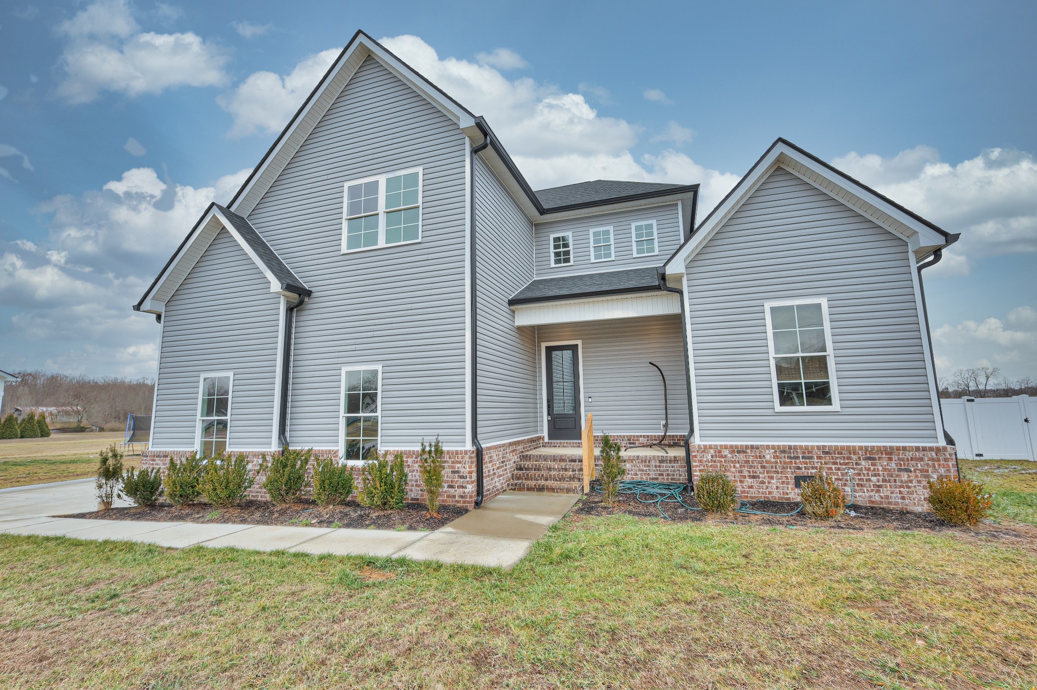 1181 Norton Road Manchester, TN 37355 - Photo 5 of 51 a front view of a house with a yard