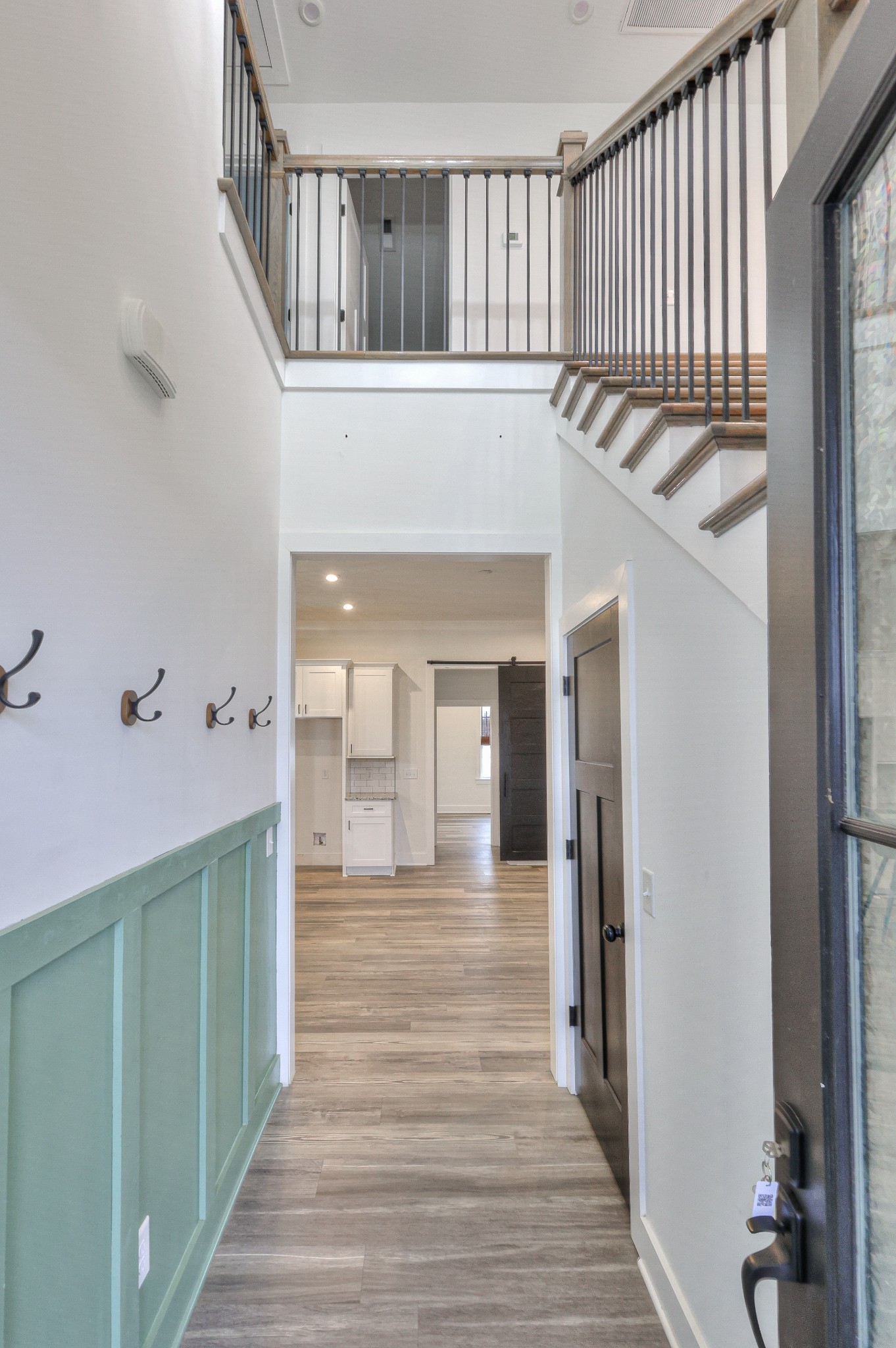 1181 Norton Road Manchester, TN 37355 - Photo 8 of 51 a hallway view with wooden floor and staircase