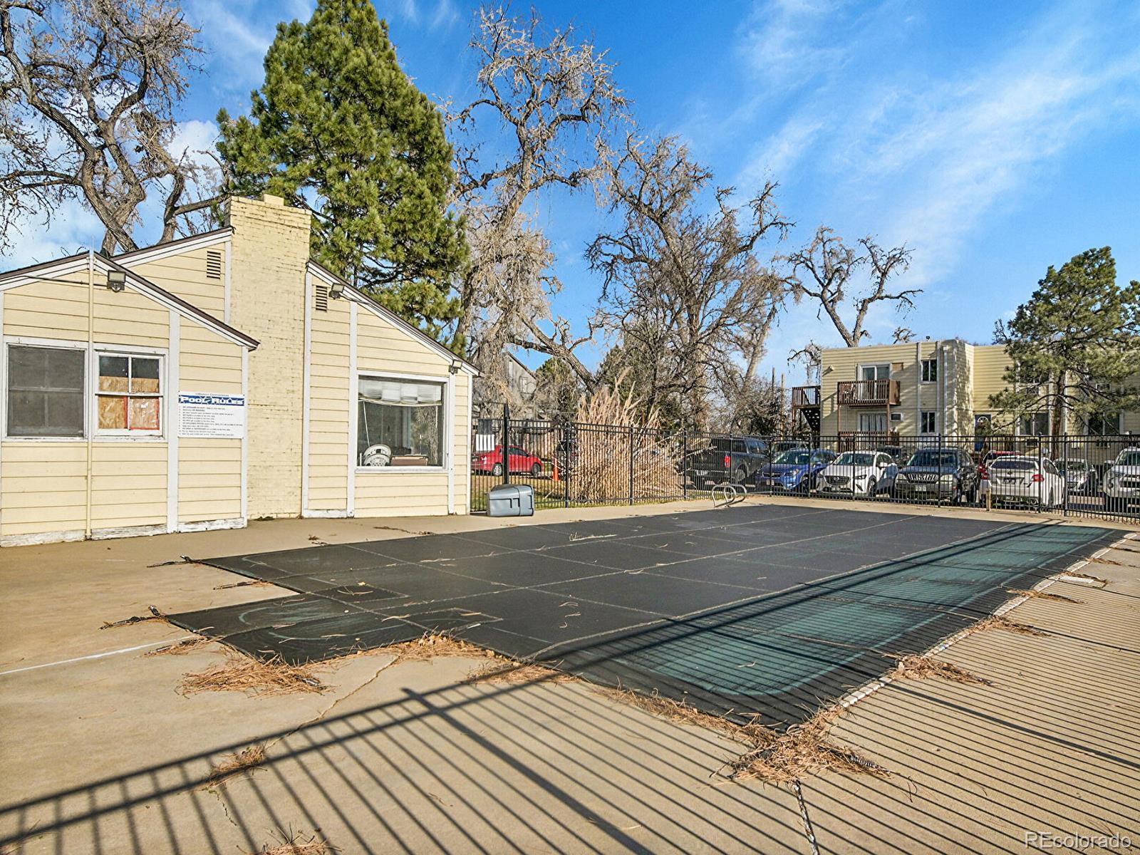 9340 West 49th Avenue, Unit 218 Wheat Ridge, CO 80033 - Photo 28 of 31 a view of street with houses