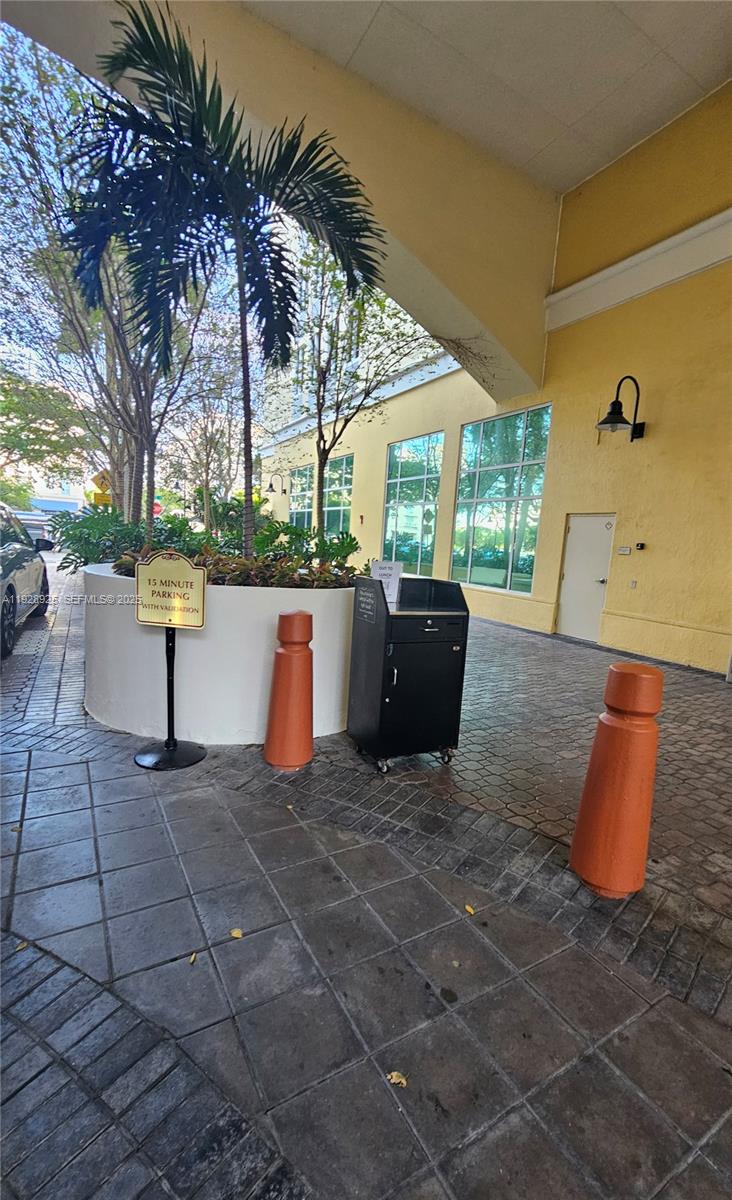 7350 Southwest 89th Street, Unit 315S Miami, FL 33156 - Photo 3 of 21 a view of a couches and table in the patio