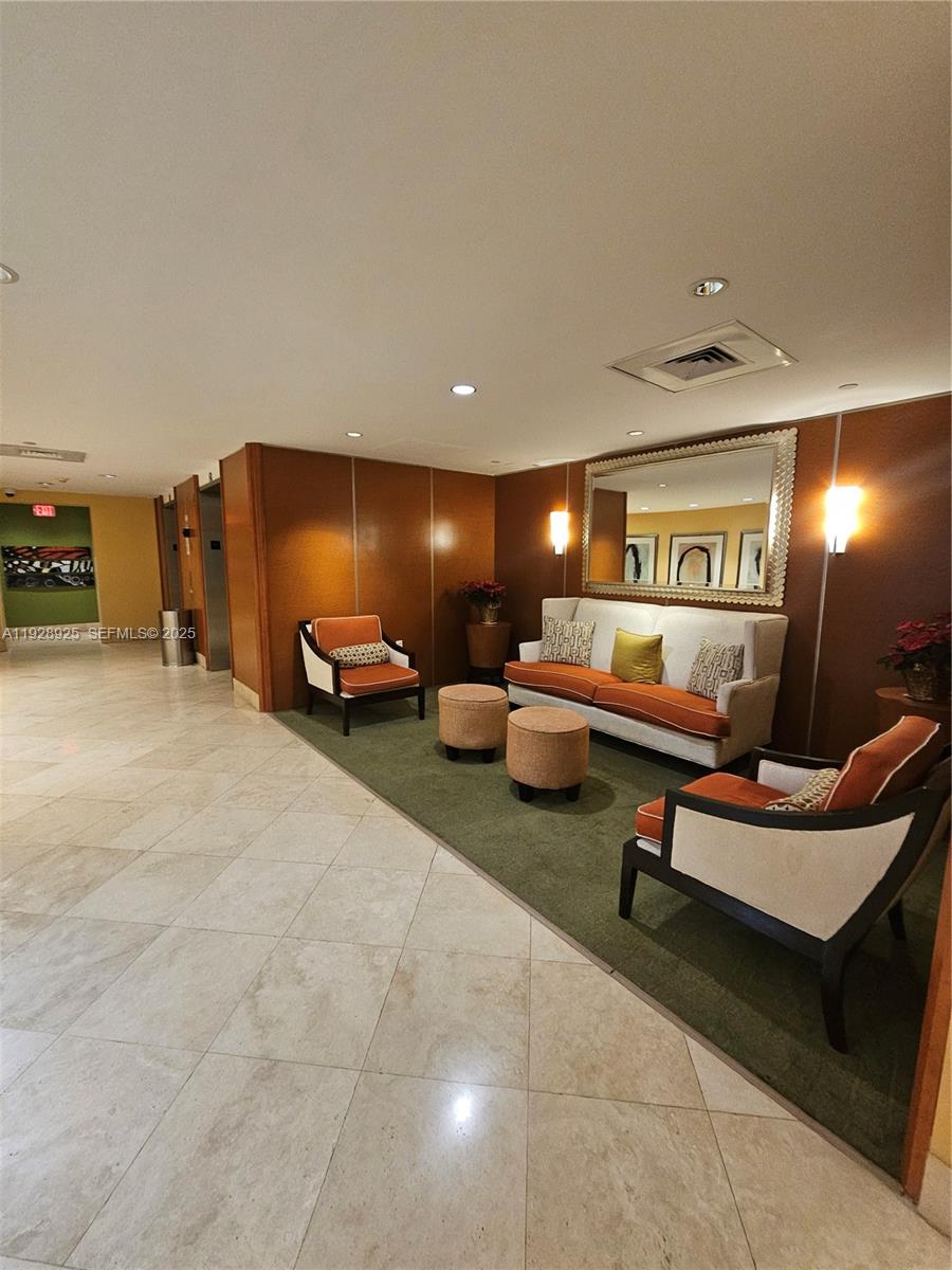 7350 Southwest 89th Street, Unit 315S Miami, FL 33156 - Photo 5 of 21 a lobby with furniture and window
