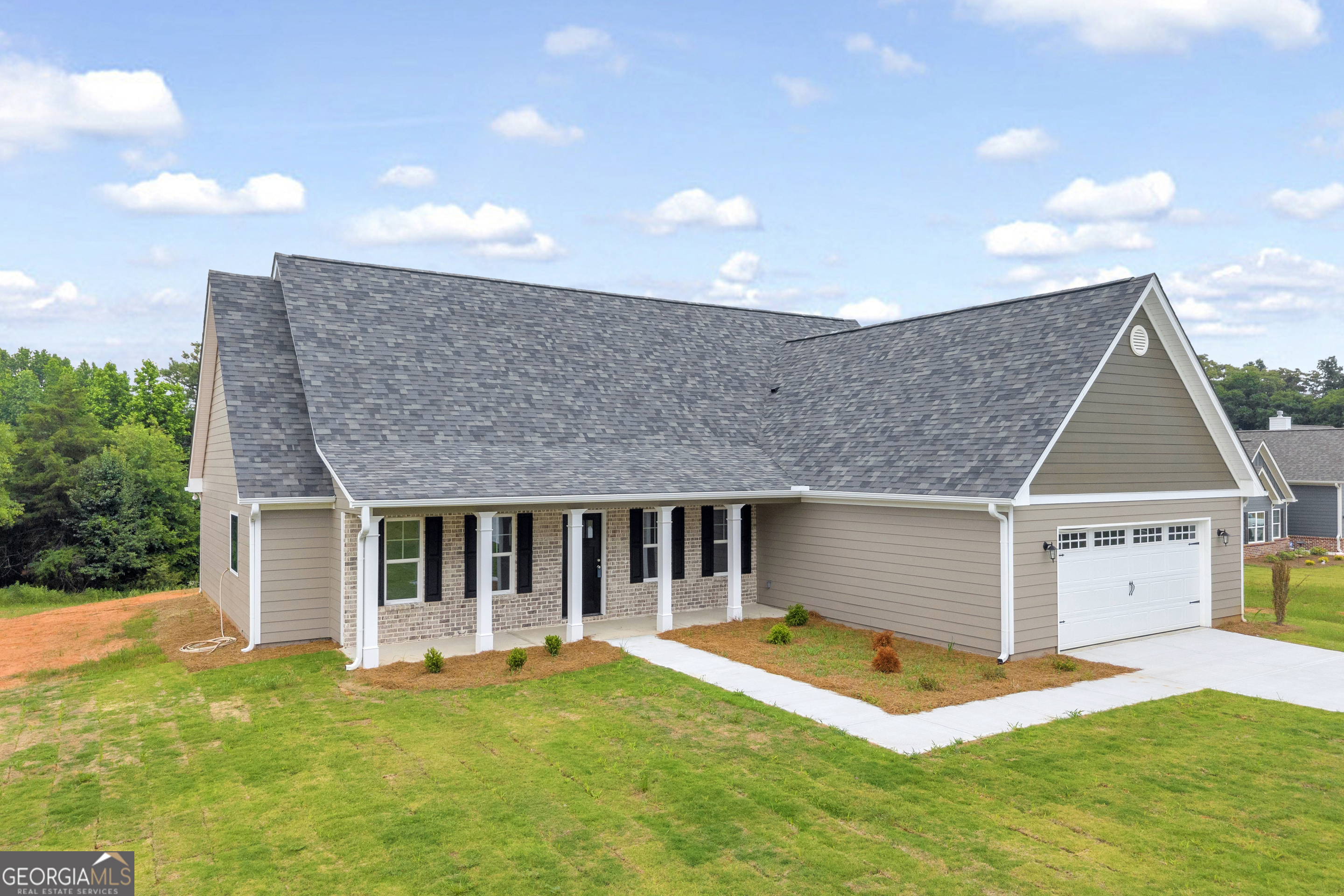 110 Sewell Road Lavonia, GA 30553 - Photo 69 of 73 a view of a house with a yard and sitting area
