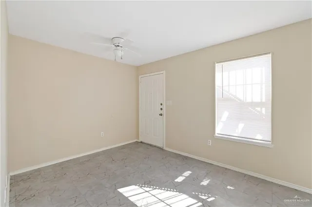 a view of a window in an empty room