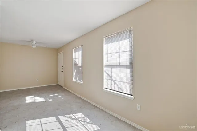 an empty room with windows