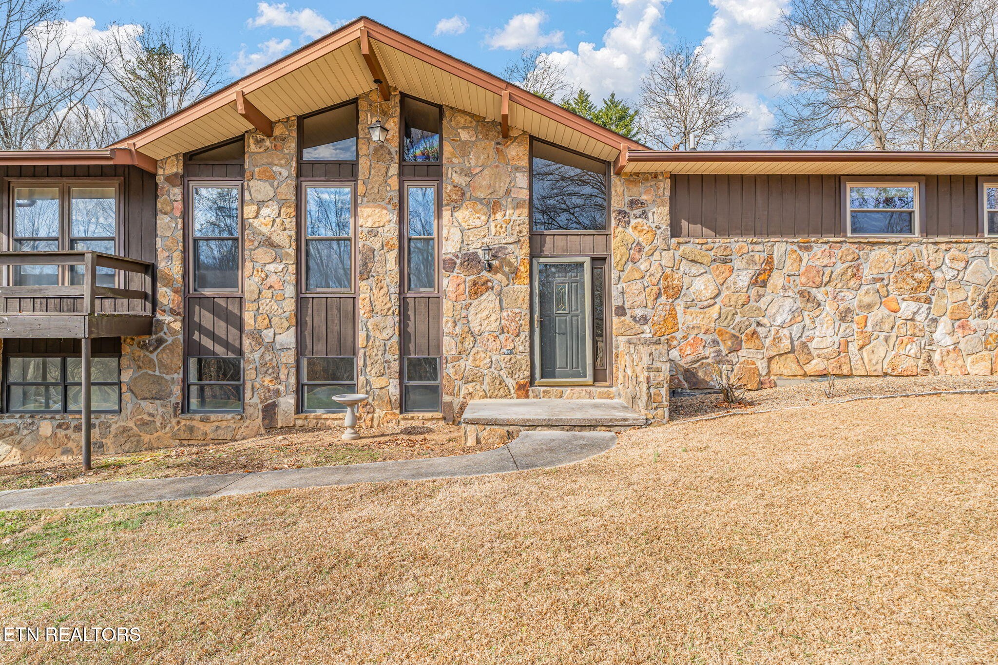 a front view of a house with a outdoor space