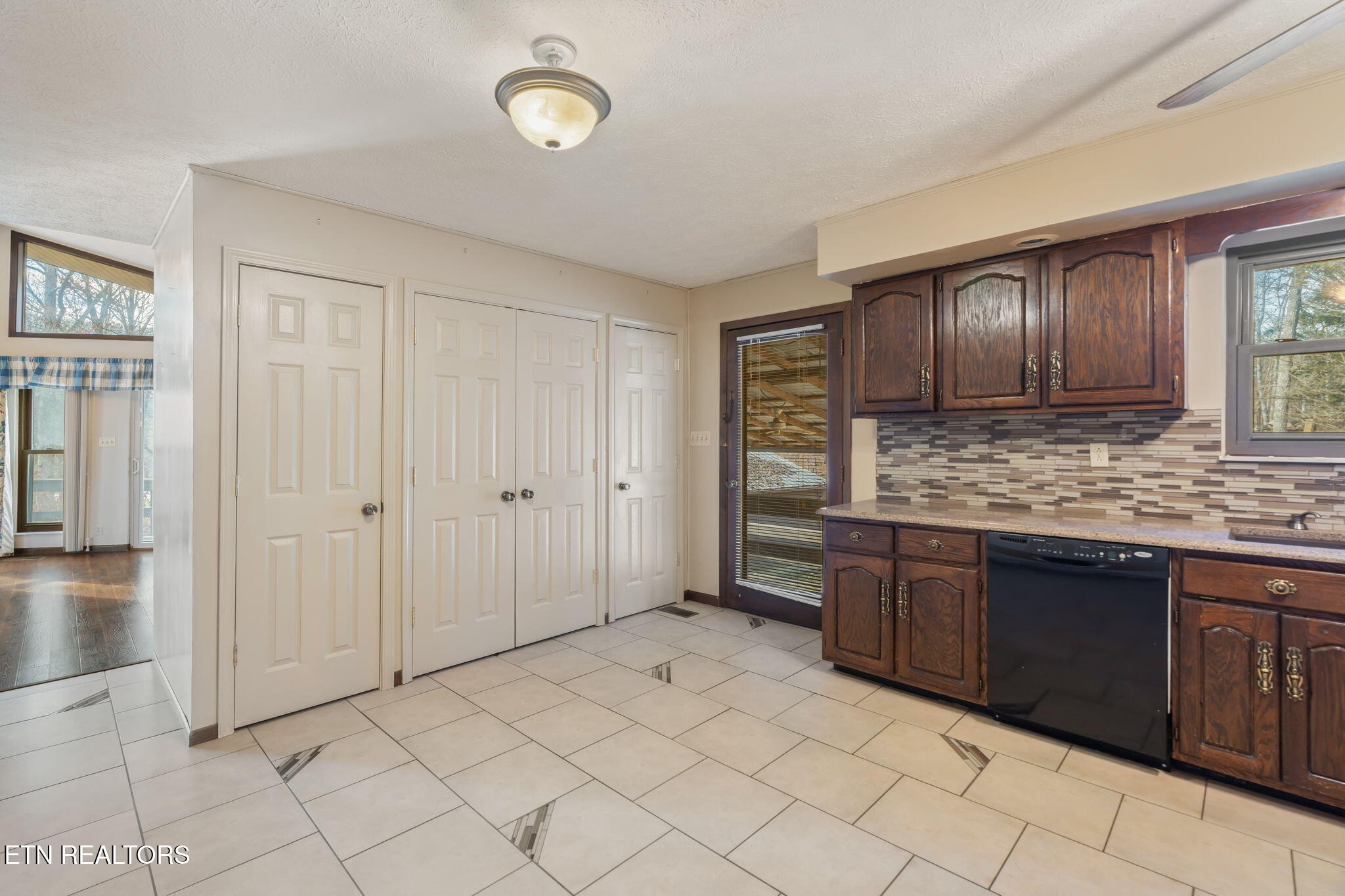 115 Jamie Street Maynardville, TN 37807 - Photo 14 of 58 a spacious bathroom with a granite countertop sink and mirror