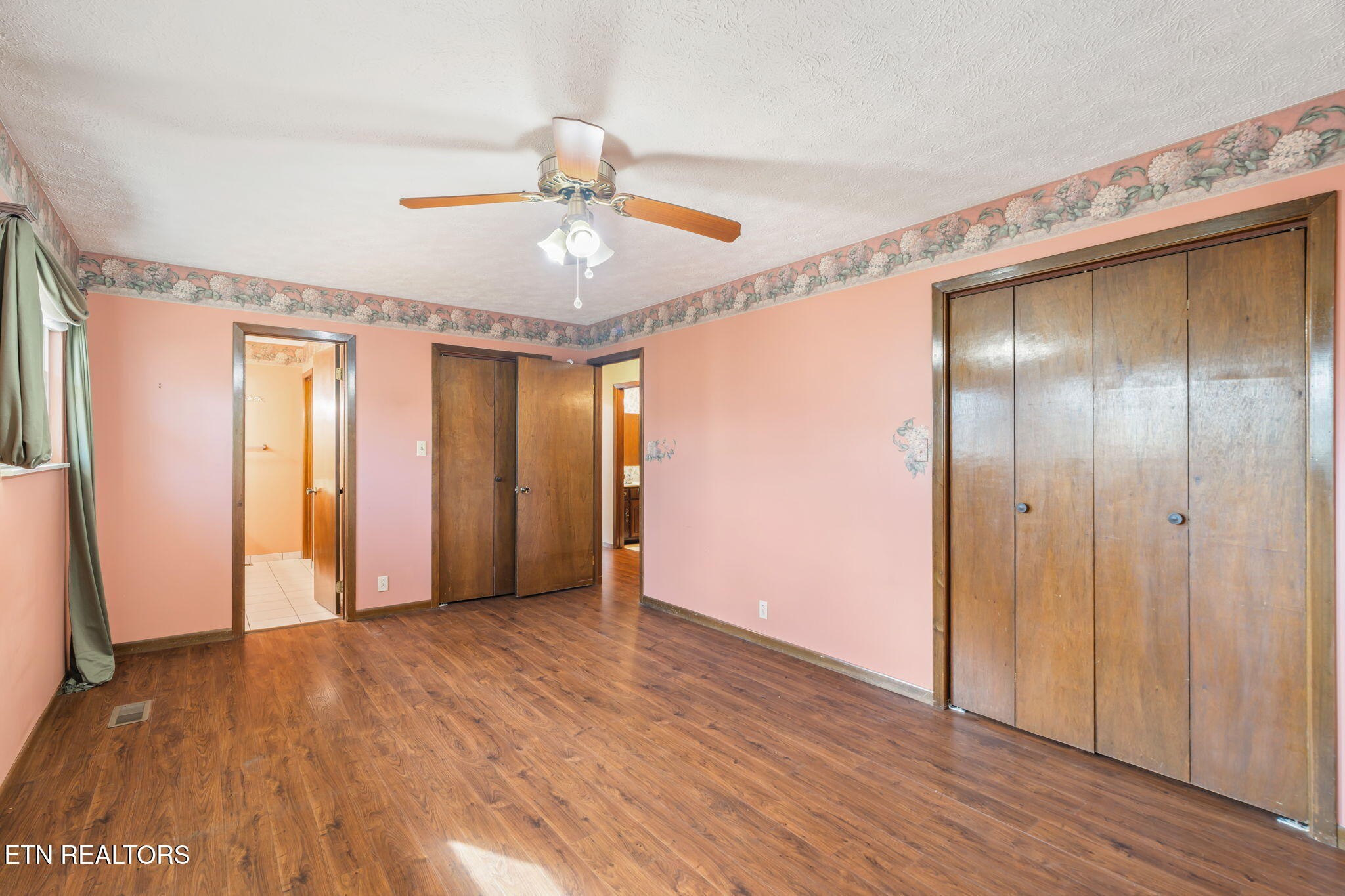 115 Jamie Street Maynardville, TN 37807 - Photo 17 of 58 a view of an empty room with wooden floor