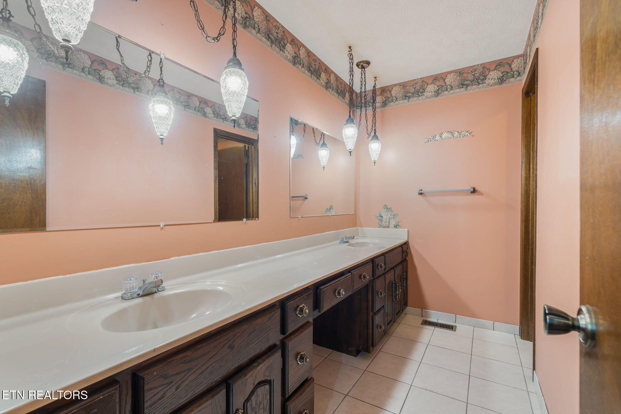115 Jamie Street Maynardville, TN 37807 - Photo 18 of 58 a bathroom with a granite countertop sink a mirror and a shower