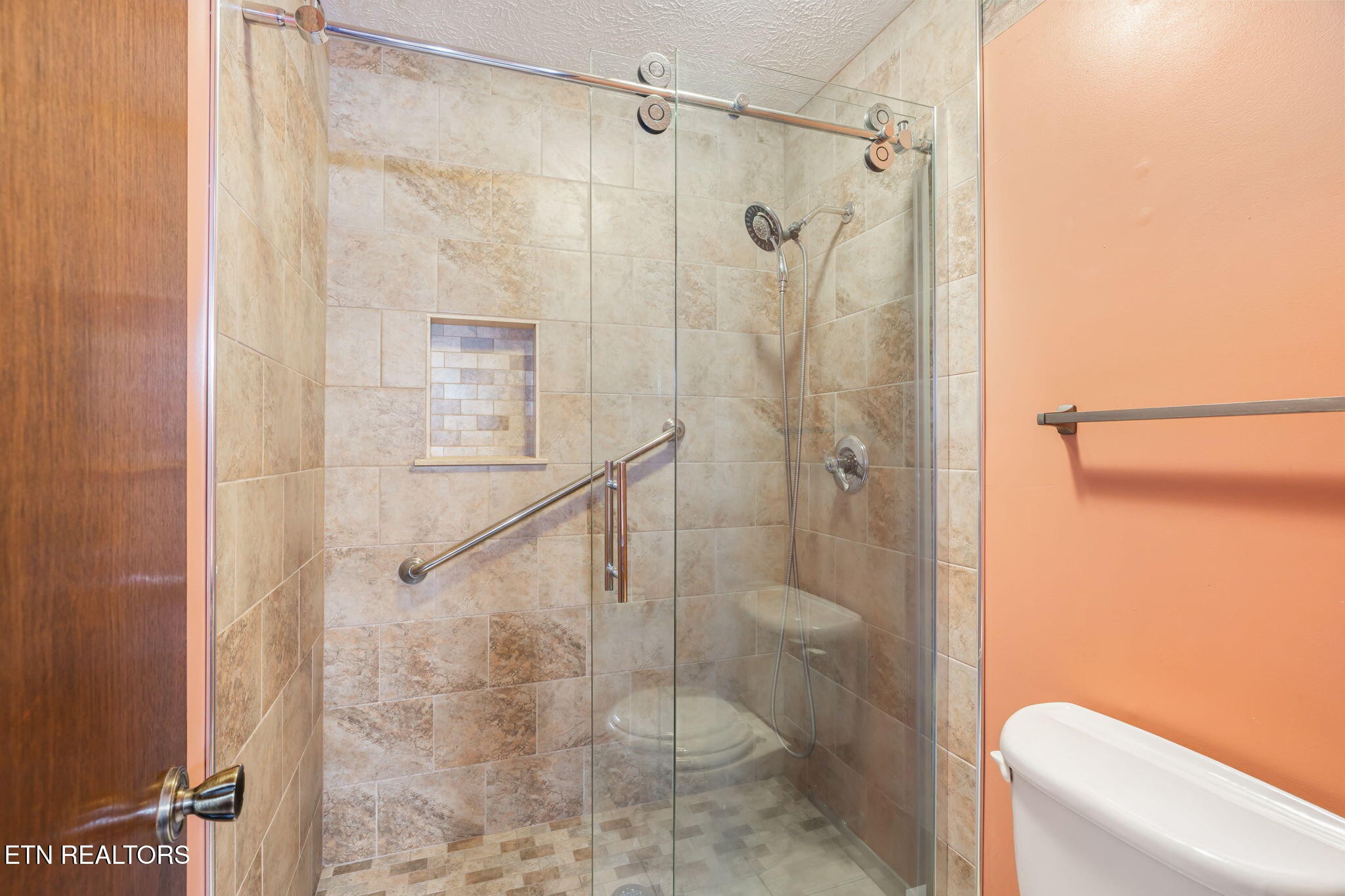 115 Jamie Street Maynardville, TN 37807 - Photo 19 of 58 a bathroom with a shower and a toilet