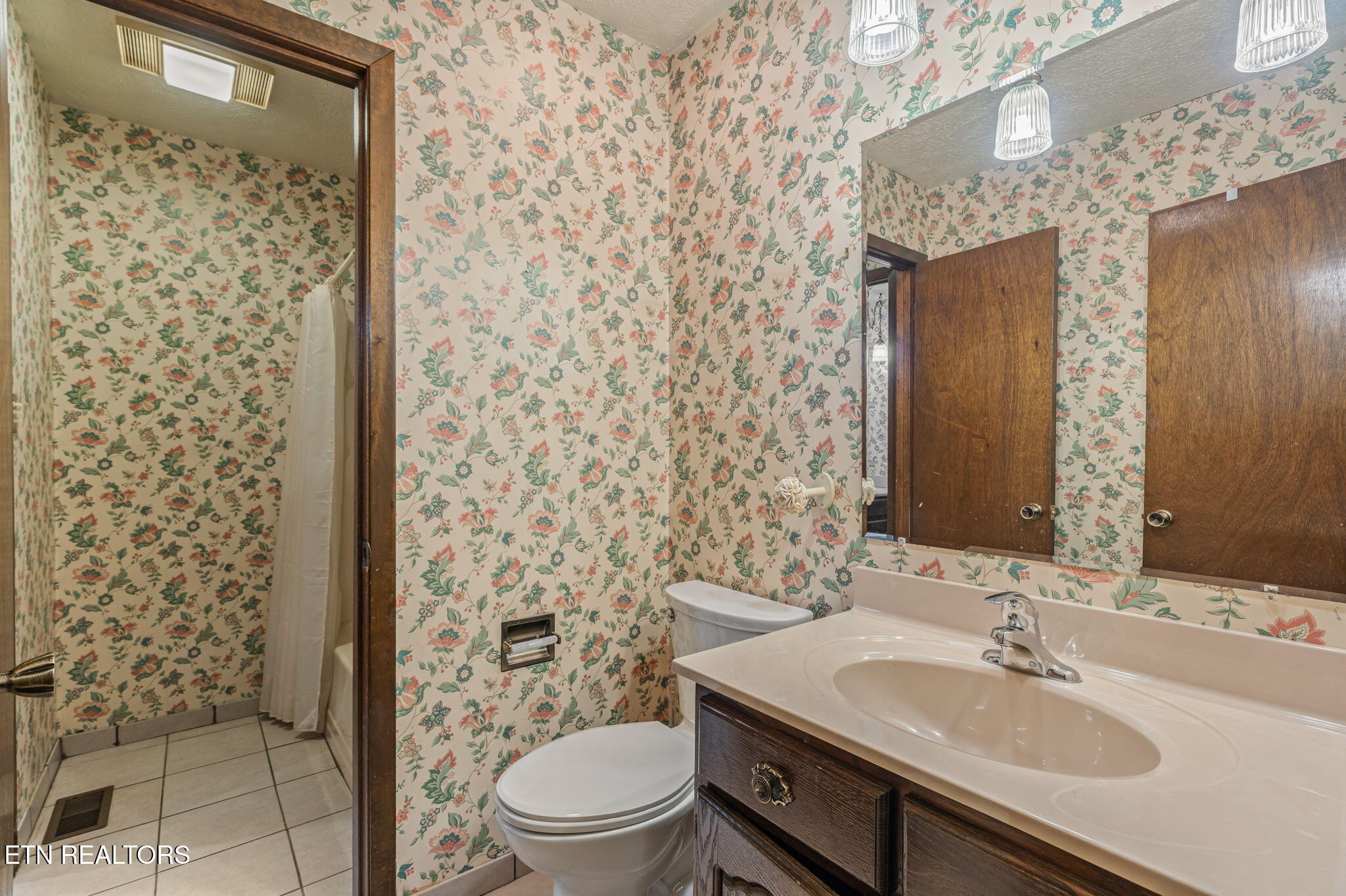 115 Jamie Street Maynardville, TN 37807 - Photo 24 of 58 a bathroom with a sink a toilet and shower