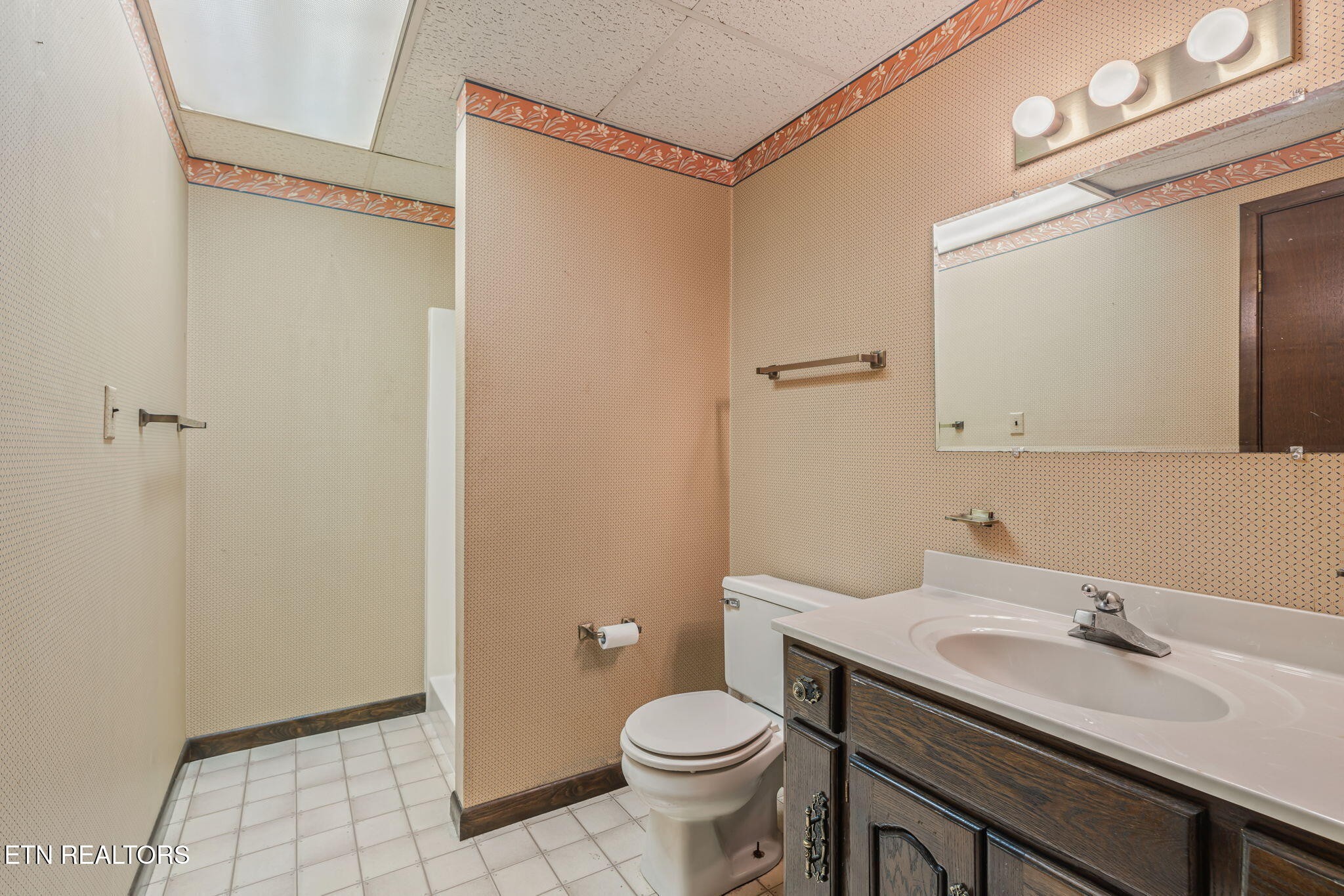 115 Jamie Street Maynardville, TN 37807 - Photo 26 of 58 a bathroom with a granite countertop sink toilet and shower