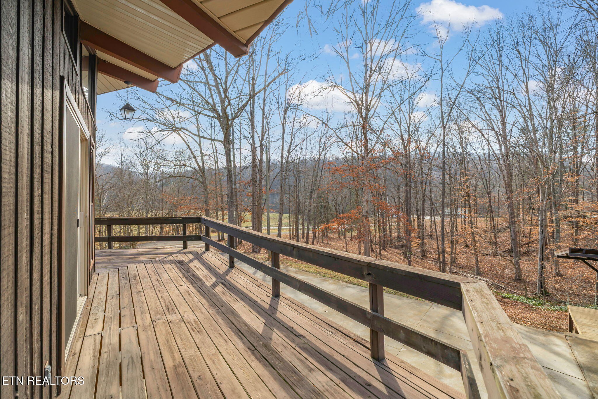 115 Jamie Street Maynardville, TN 37807 - Photo 32 of 58 a view of balcony with wooden floor and fence