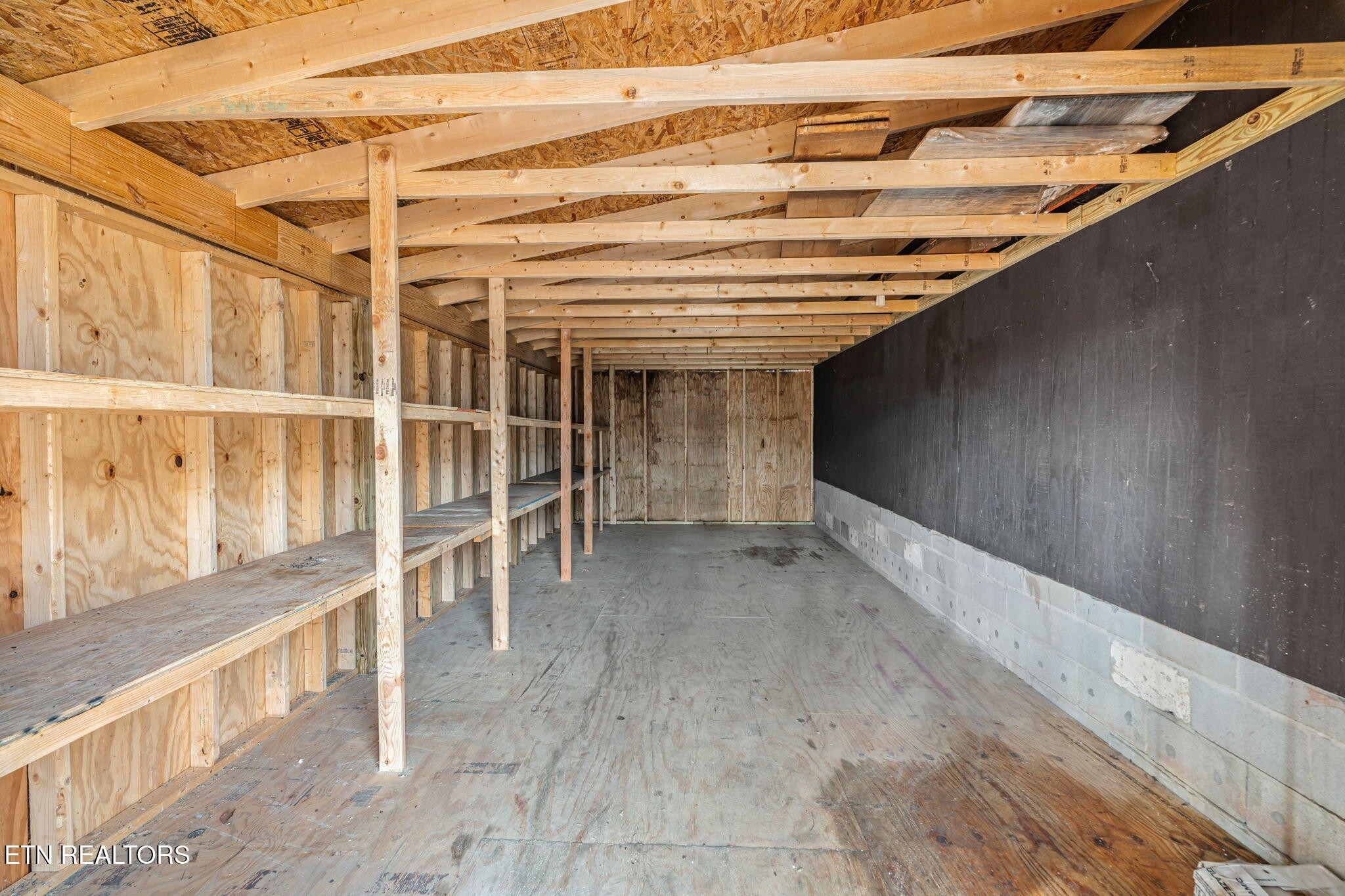 115 Jamie Street Maynardville, TN 37807 - Photo 46 of 58 a view of walk in closet with wooden floor