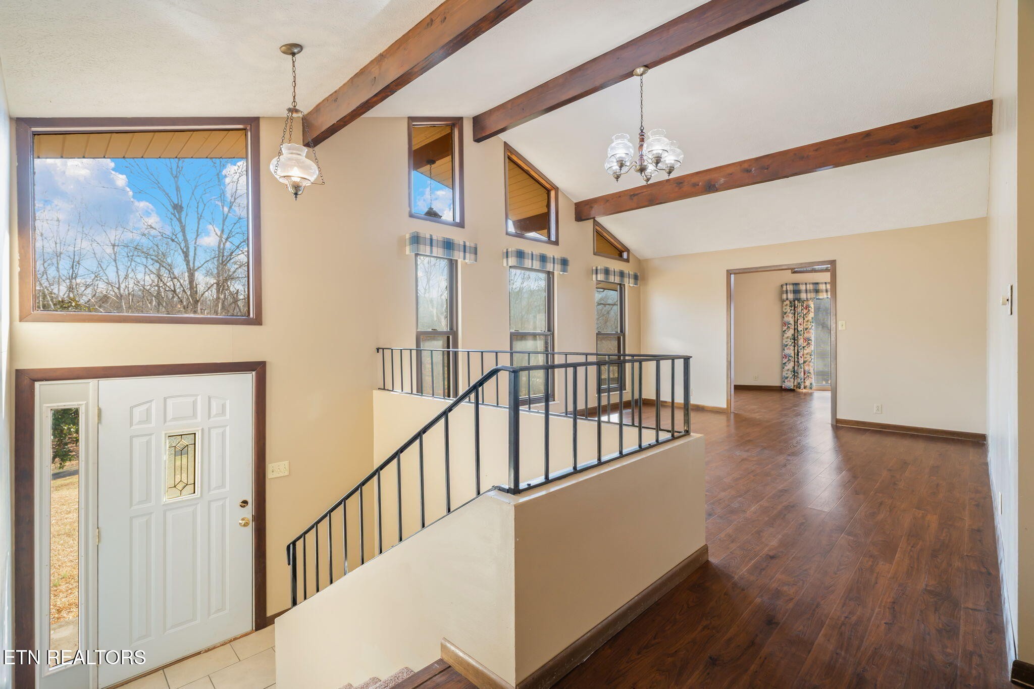 115 Jamie Street Maynardville, TN 37807 - Photo 5 of 58 a view of a hallway with wooden floor and windows