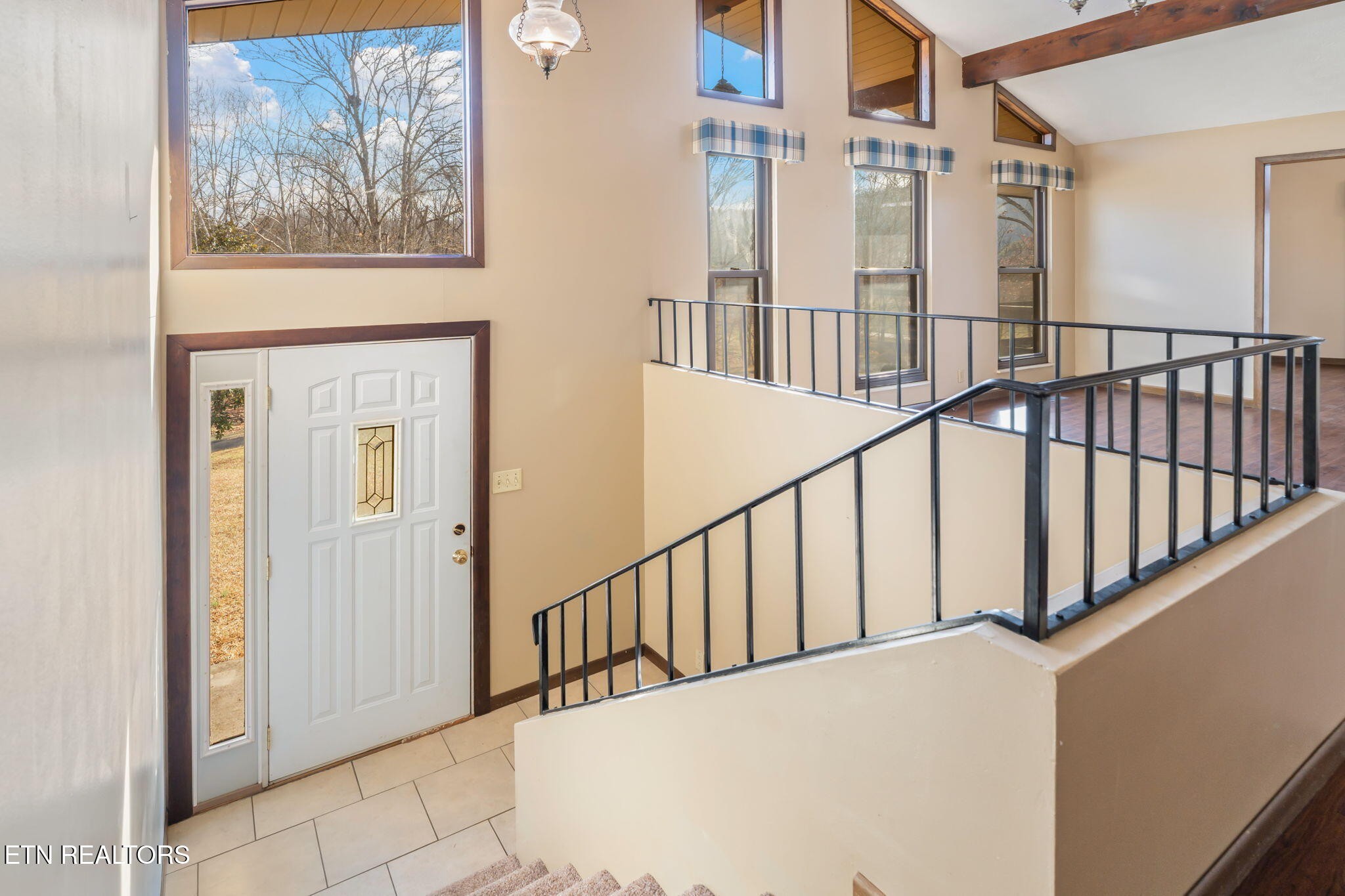 115 Jamie Street Maynardville, TN 37807 - Photo 6 of 58 a view of staircase with lots of frames on wall