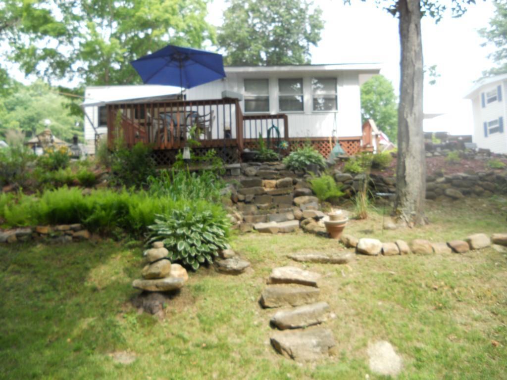 R R South Road Stafford Springs, CT 06076 - Photo 1 of 1 a view of a house with a yard