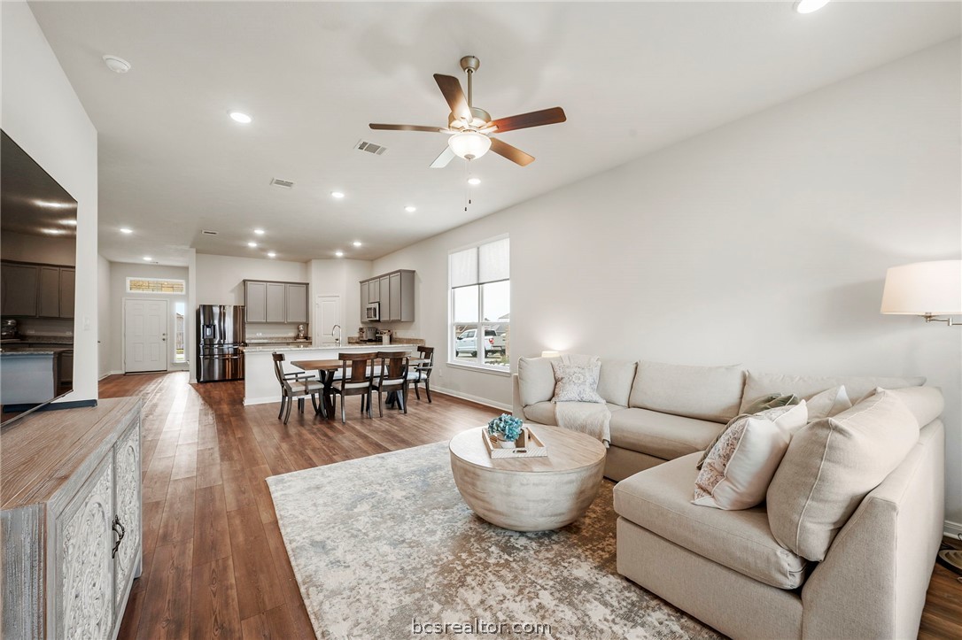 2038 Viva Road Bryan, TX 77807 - Photo 7 of 21 Spacious main gathering area with warm flooring and ideal layout for relaxing or hosting guests