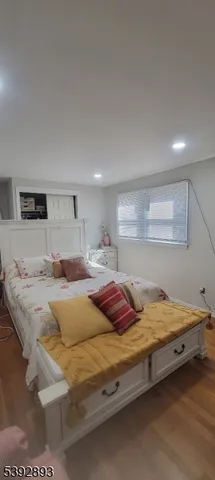 a bedroom with furniture and a bed