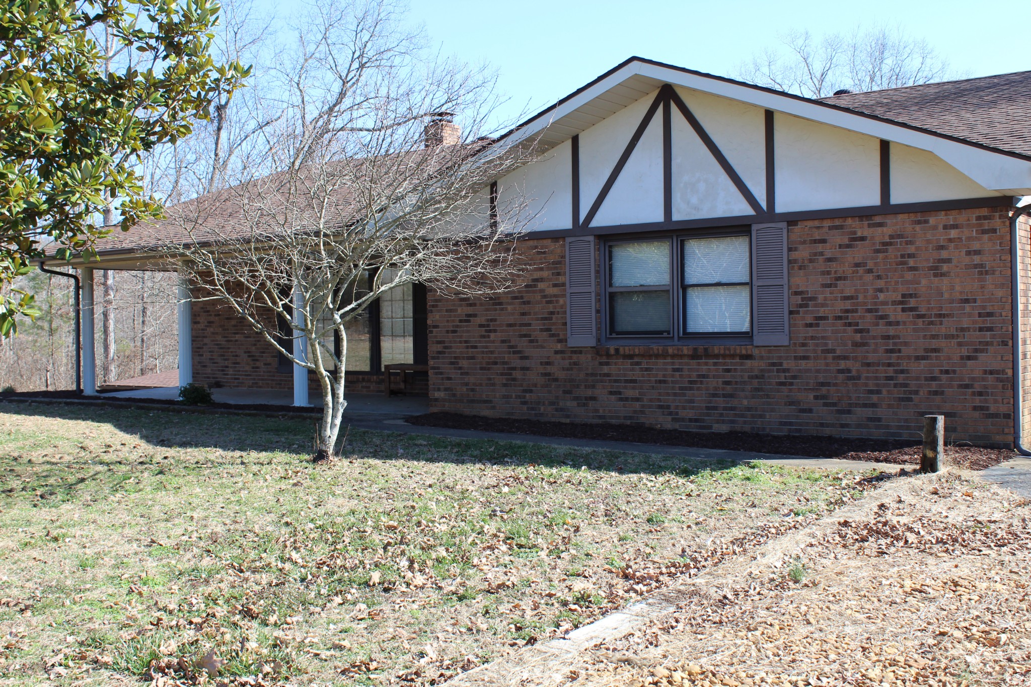 4165 Buckeye Road Cumberland City, TN 37050 - Photo 1 of 20 a view of a house with a yard