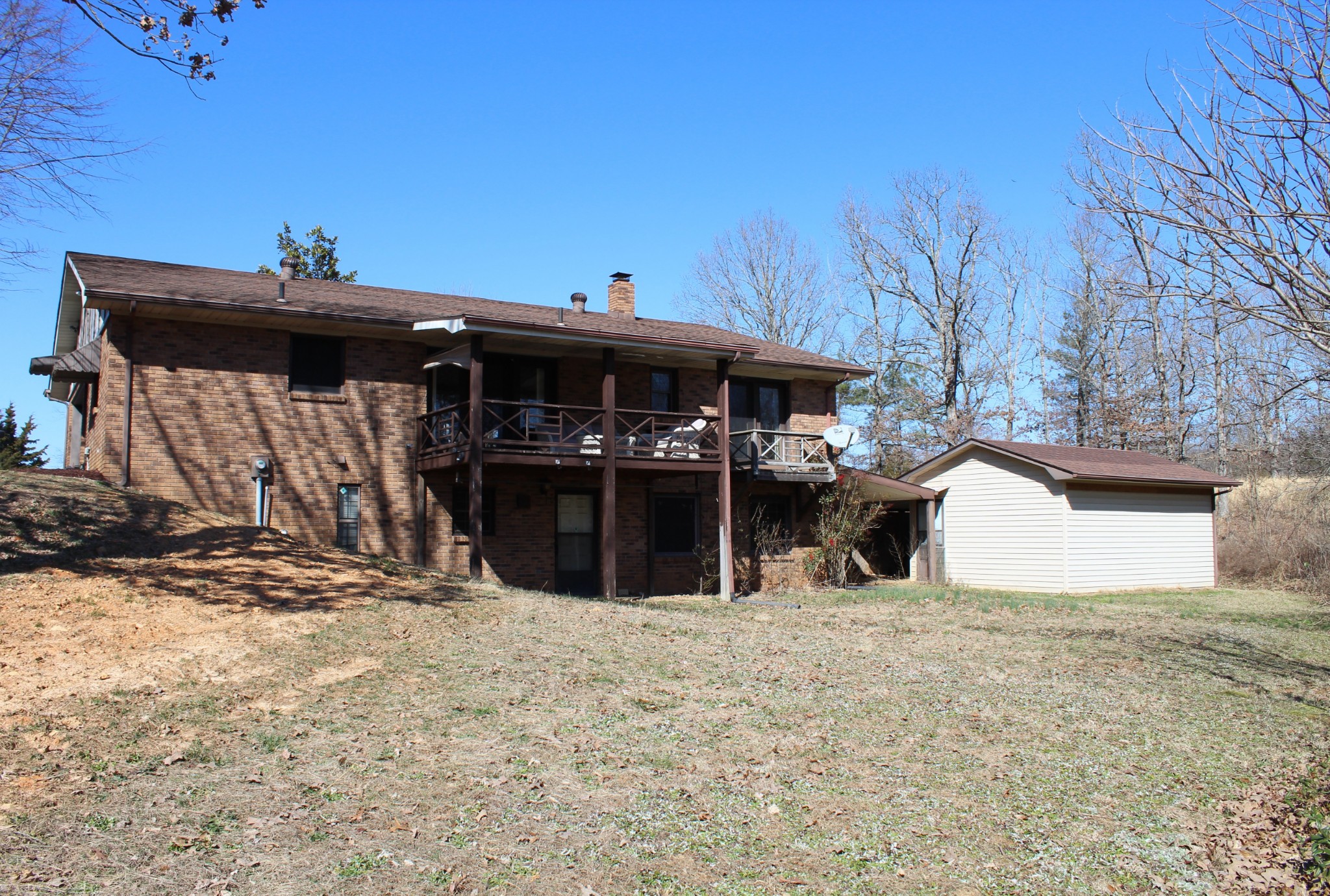 4165 Buckeye Road Cumberland City, TN 37050 - Photo 3 of 20 a view of a house with a snow in the background