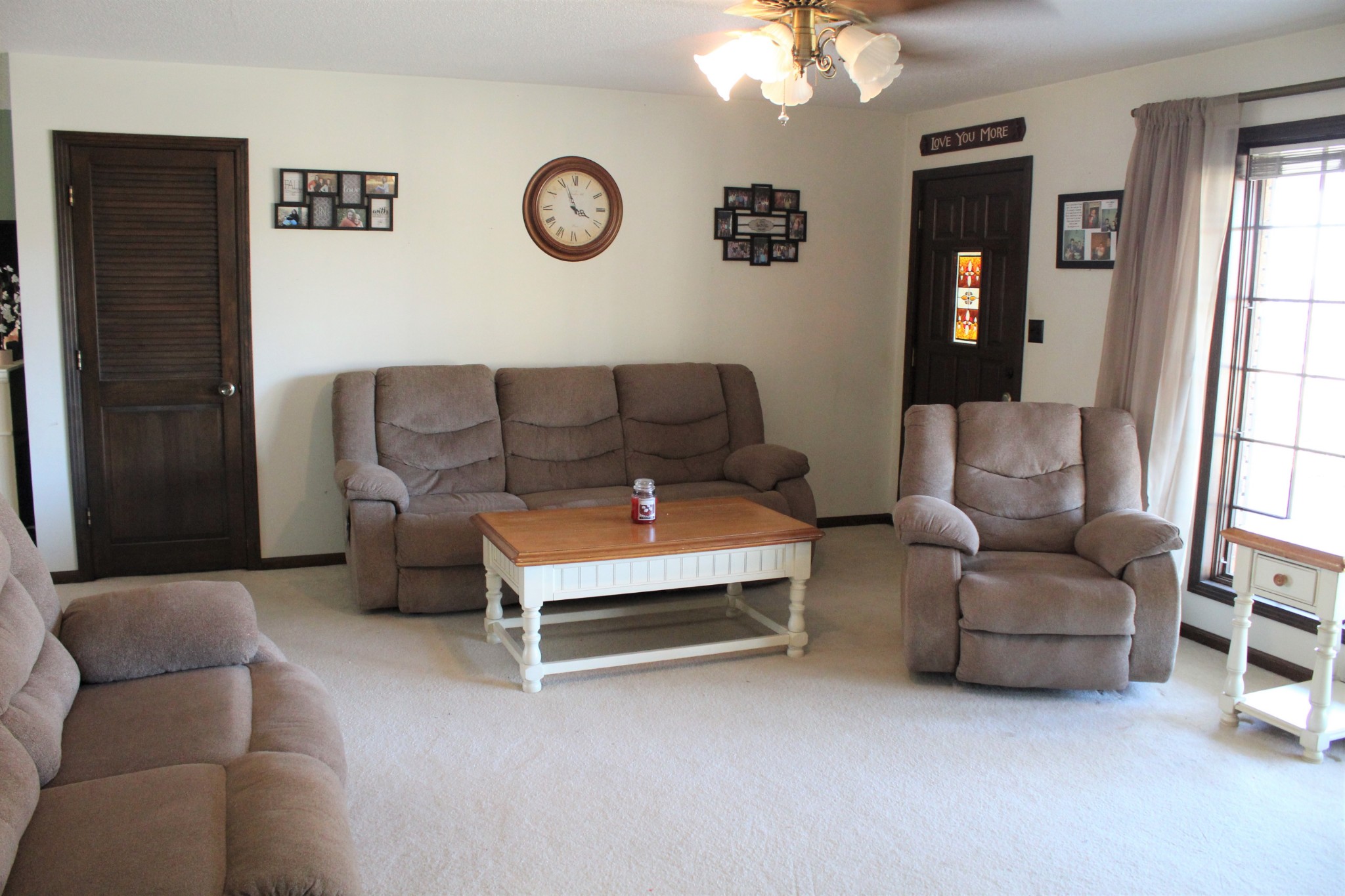 4165 Buckeye Road Cumberland City, TN 37050 - Photo 6 of 20 a living room with furniture and a window