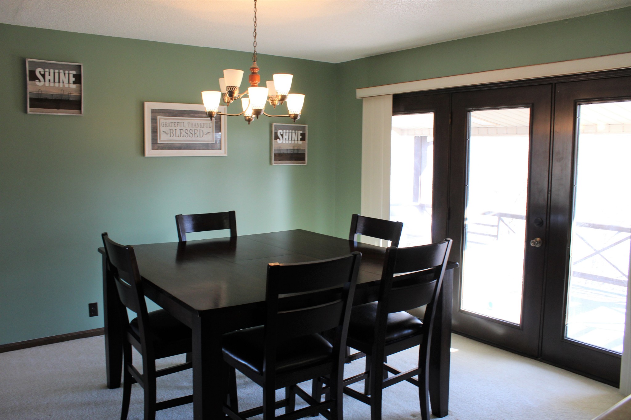 4165 Buckeye Road Cumberland City, TN 37050 - Photo 9 of 20 a view of a dining room with a table and chairs